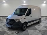 the white van is parked on a checkered floor in a room