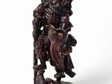 an image of a wooden statue of a man holding a sword