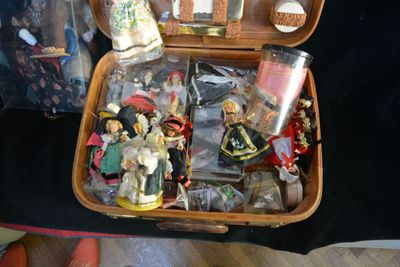 a suitcase full of toys sitting on top of a table