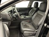 the interior of a car with two seats and a steering wheel