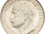 an old silver coin with a man ' s face on it