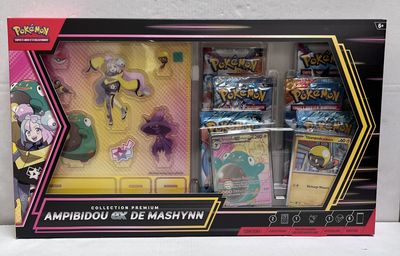 une boîte de cartes Pokémon qui se trouvent dans la boîte