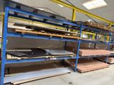 many shelves in the warehouse with many items on them
