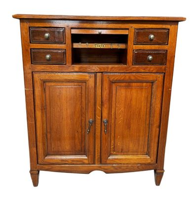 an image of a wooden cabinet with drawers and drawers