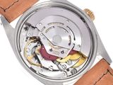 an image of a close up of a watch on a white surface