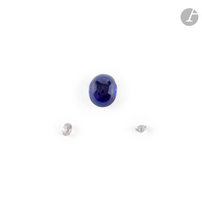 a close up of a pair of sapphires on a white surface