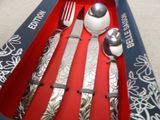a box with a set of silverware in it