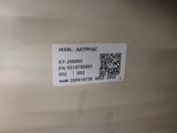 a close up of a label on the back of a refrigerator