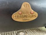 an image of a close up of a metal object with a brass plate