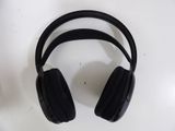 a pair of black headphones on a white table