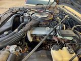 a car engine with a lot of hoses in it