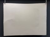 an image of a piece of paper hanging on a black wall