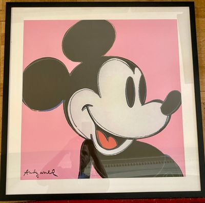 framed picture of mickey mouse on pink background in black frame