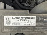 a picture of a car engine with a label on it