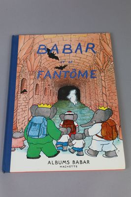 a book with a picture of a group of animals