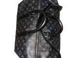a black and white bag with a handle on it