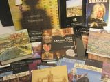a lot of books that are sitting on a table