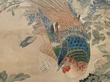 a painting of a bird that is on the wall