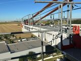 a view of a construction site from the top of a building