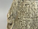 a close up of a stone statue of a man ' s face