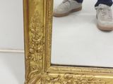 a person standing in front of a mirror with their reflection