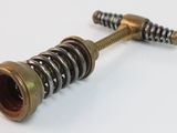 an image of a close up of a metal spring on a white surface