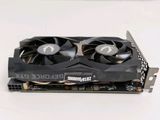 a close up of a video card with two fans on top of it