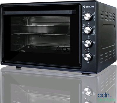 une photo d'un four grille-pain dont la porte est ouverte