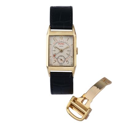 une image représentant une montre et une ceinture sur fond blanc