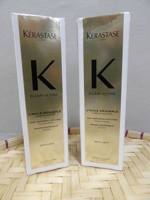 two bottles of kerastasese serum ultimate