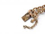 a gold chain with a padlock attached to it