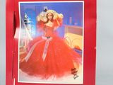 the barbie doll is in the box on the table