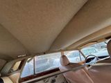 a view of the back of a car from the passenger seat