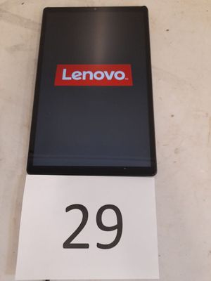 a sign that says lenovo on it next to a phone