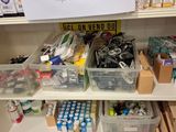 a shelf filled with lots of assorted items in a store