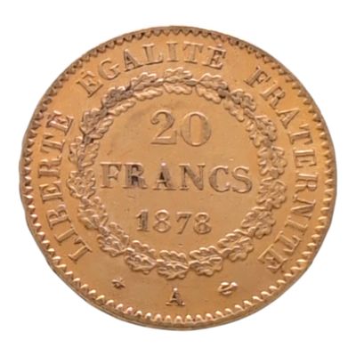 une vieille pièce française de 20 francs sur laquelle figure une couronne