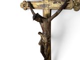 a wooden cross with a crucifix on it