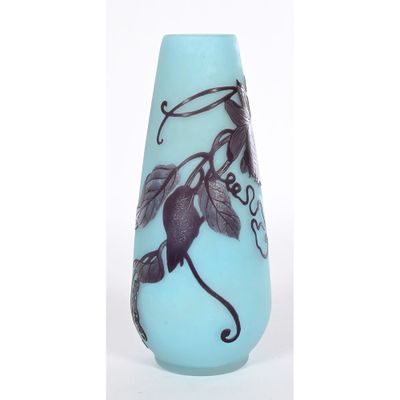 a blue vase with a black design on it