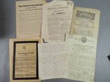some old papers are sitting on top of a table
