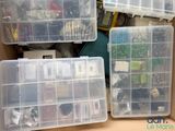 many plastic containers that are sitting in a box