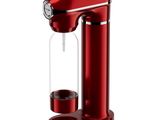 an image of a red coffee maker on a white background