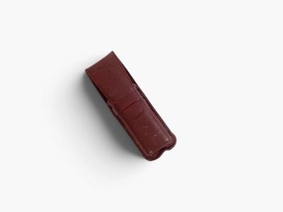 a close up of a piece of chocolate on a white surface
