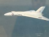 un jet blanc filant dans les airs sur un arrière-plan flou