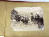 an old photo of a group of men standing next to each other