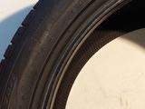 a close up of a tire on the side of a car