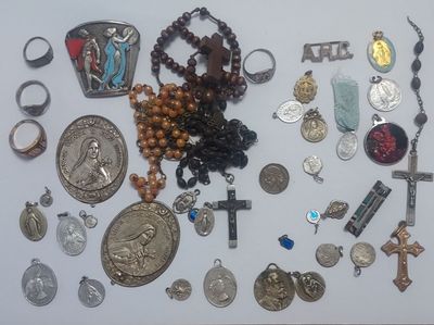 a lot of religious items that are on the table