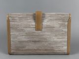 an image of a women ' s wallet with a leather strap