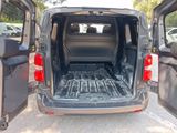the back of a van with the doors open and the cargo compartment in the back