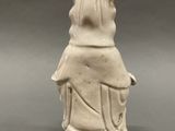 an image of a white statue of a woman holding a baby