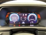 the dashboard of a car with a digital display on it